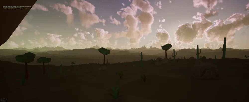 Faceted desert vegetation and cacti silhouetted against a softly lit evening sky.