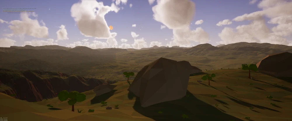 Large angular rock and sparse trees above a savanna canyon.